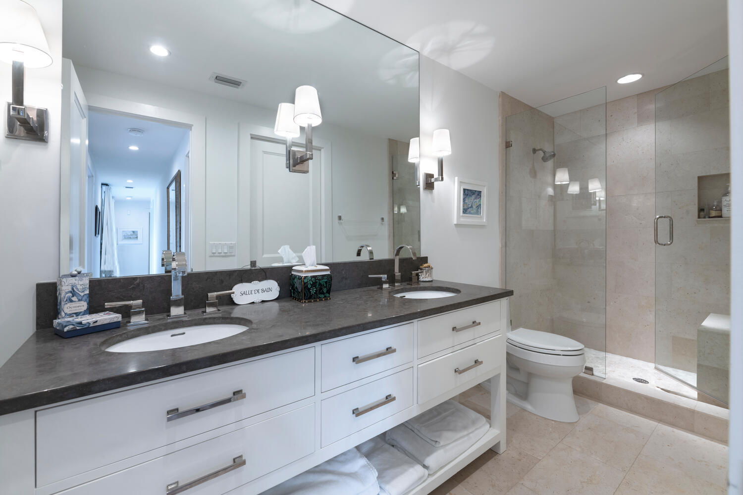 1041 Gulfstream Way Riviera Beach, FL 33404 - Photo 27 of 39 a bathroom with a double vanity sink mirror and toilet