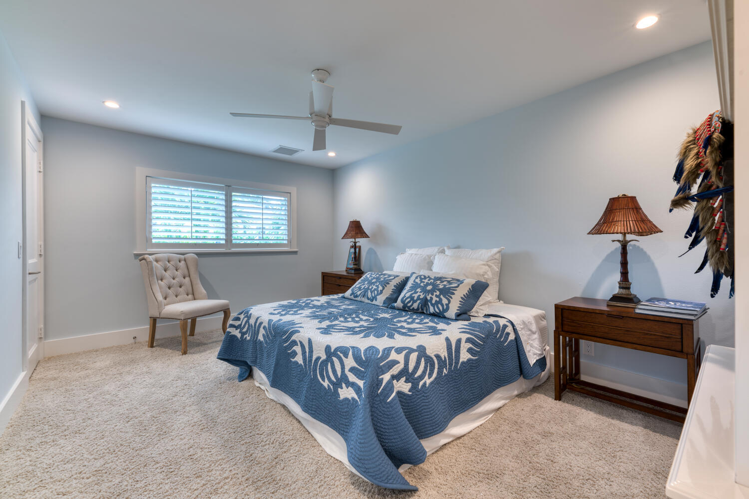 1041 Gulfstream Way Riviera Beach, FL 33404 - Photo 28 of 39 a bedroom with a bed and a chandelier