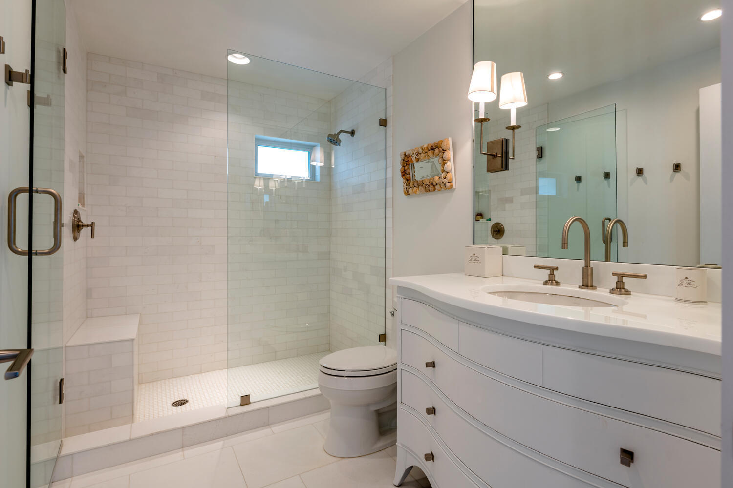 1041 Gulfstream Way Riviera Beach, FL 33404 - Photo 29 of 39 a bathroom with a sink a toilet and shower
