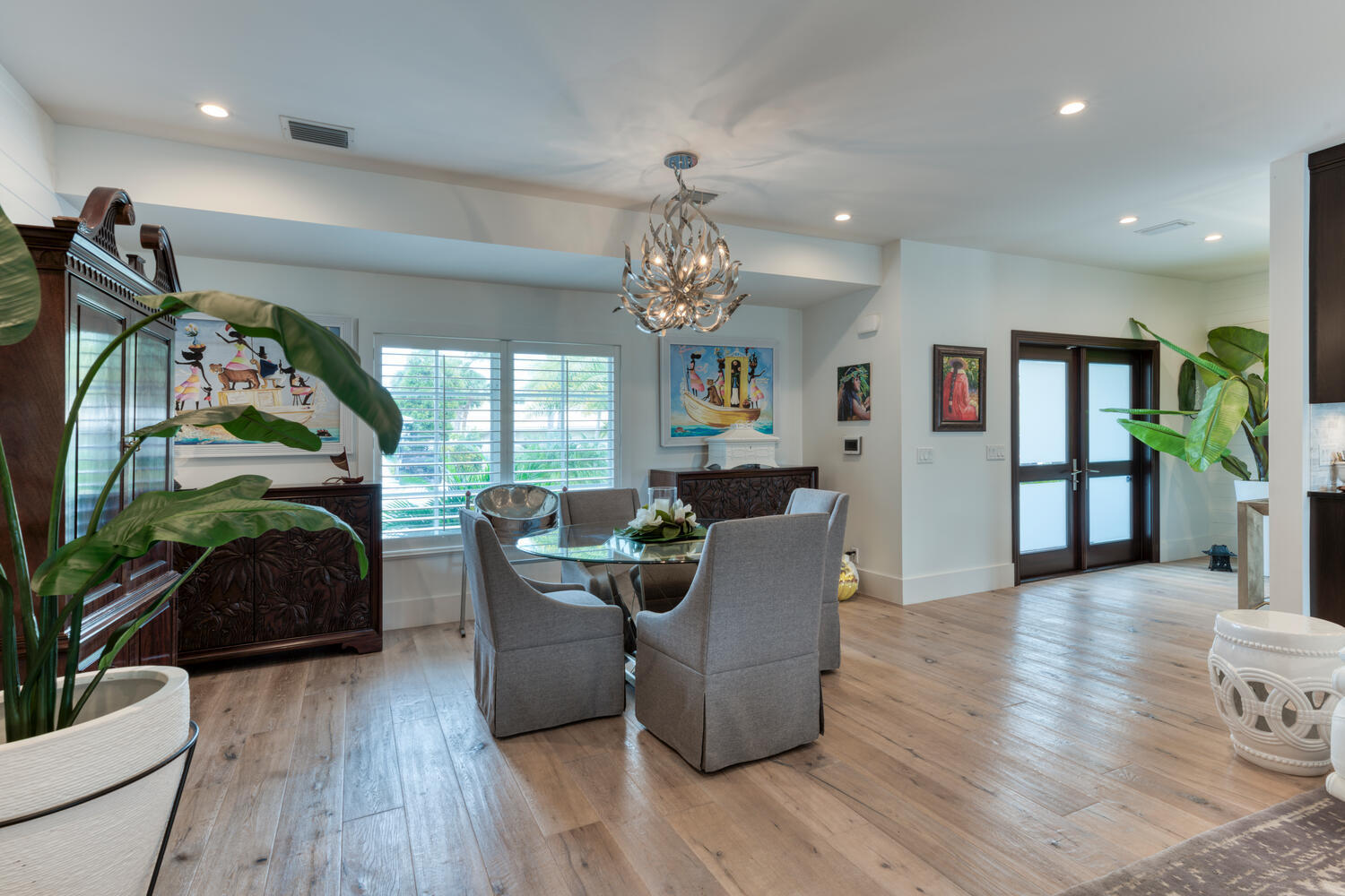 1041 Gulfstream Way Riviera Beach, FL 33404 - Photo 36 of 39 a living room with furniture a potted plant and wooden floor