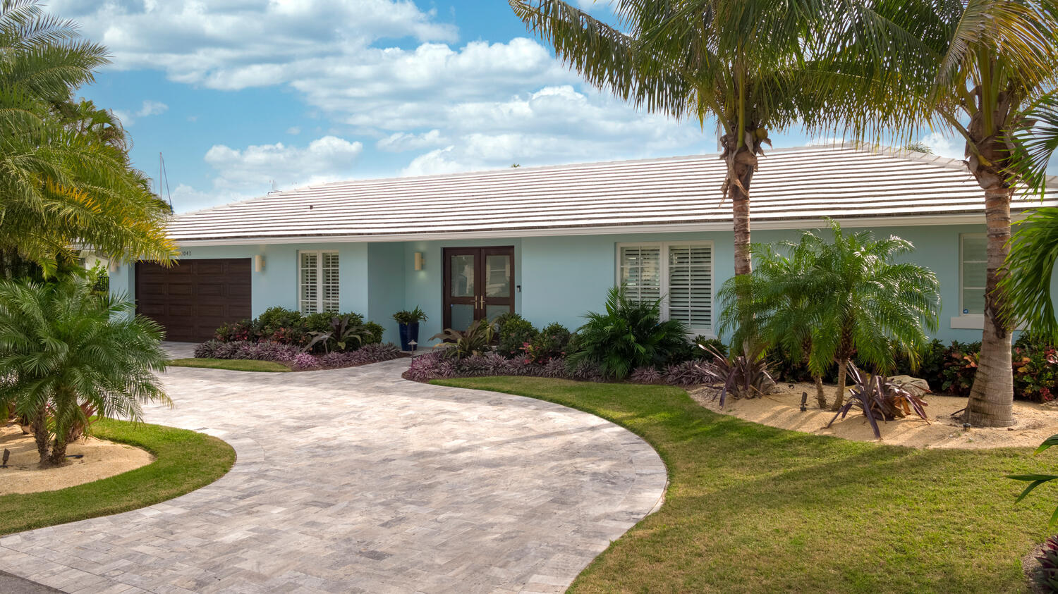 1041 Gulfstream Way Riviera Beach, FL 33404 - Photo 38 of 39 a view of a backyard with a patio