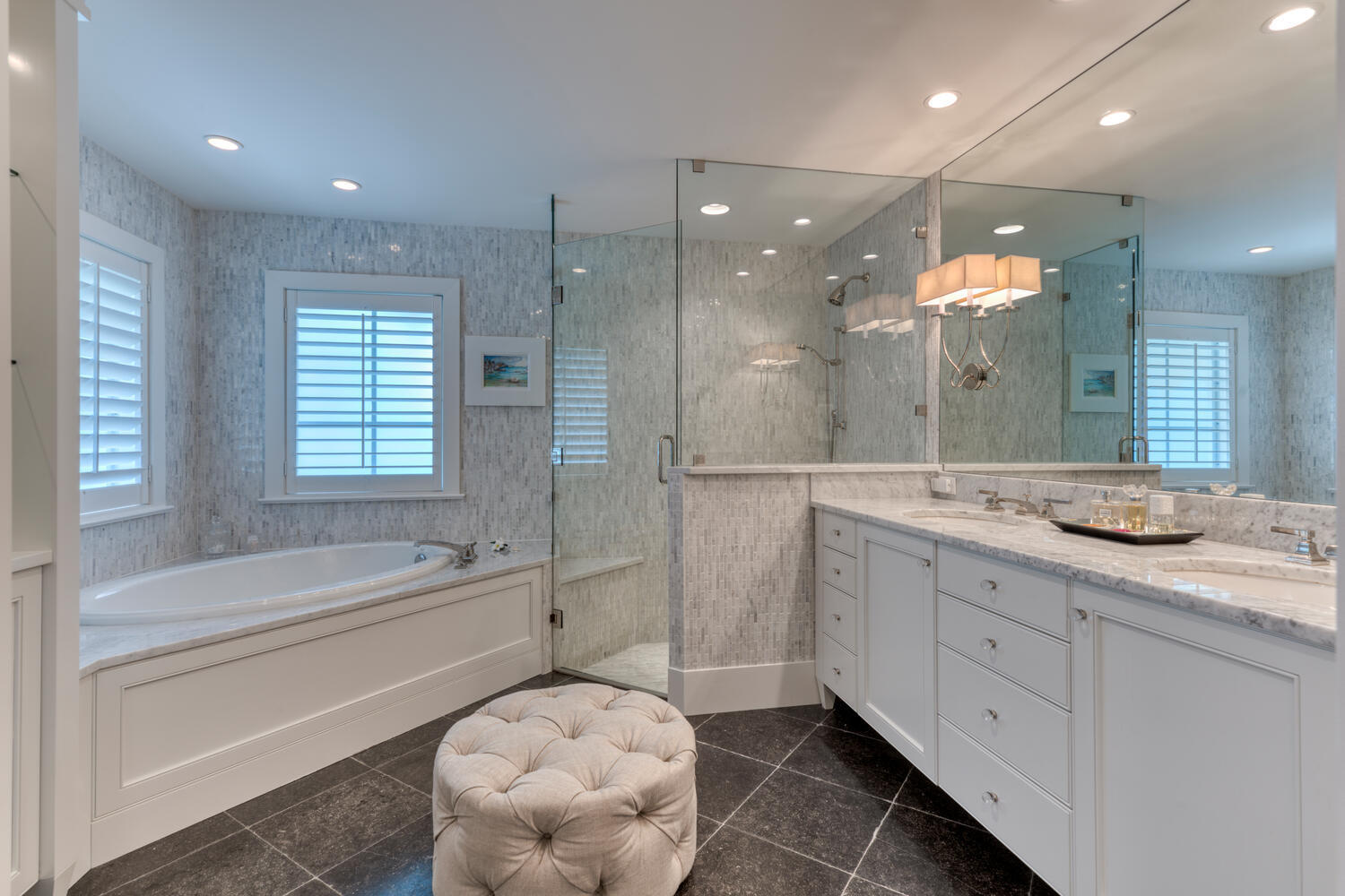 1041 Gulfstream Way Riviera Beach, FL 33404 - Photo 7 of 39 a bathroom with a granite countertop sink a toilet a mirror and bathtub