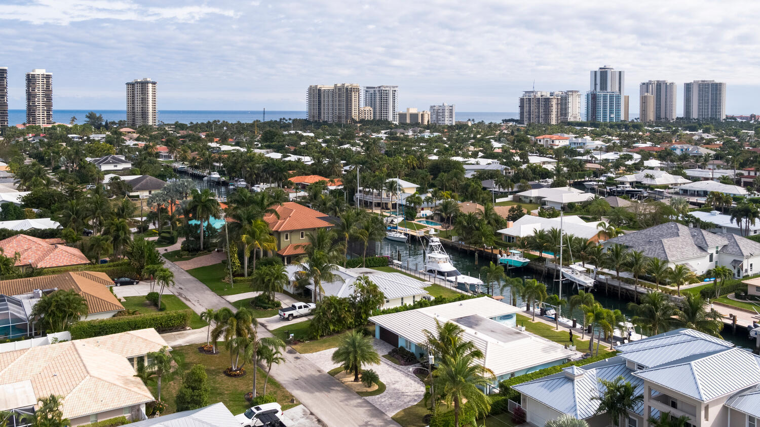 1041 Gulfstream Way Riviera Beach, FL 33404 - Photo 10 of 39 an aerial view of a city with lots of residential buildings