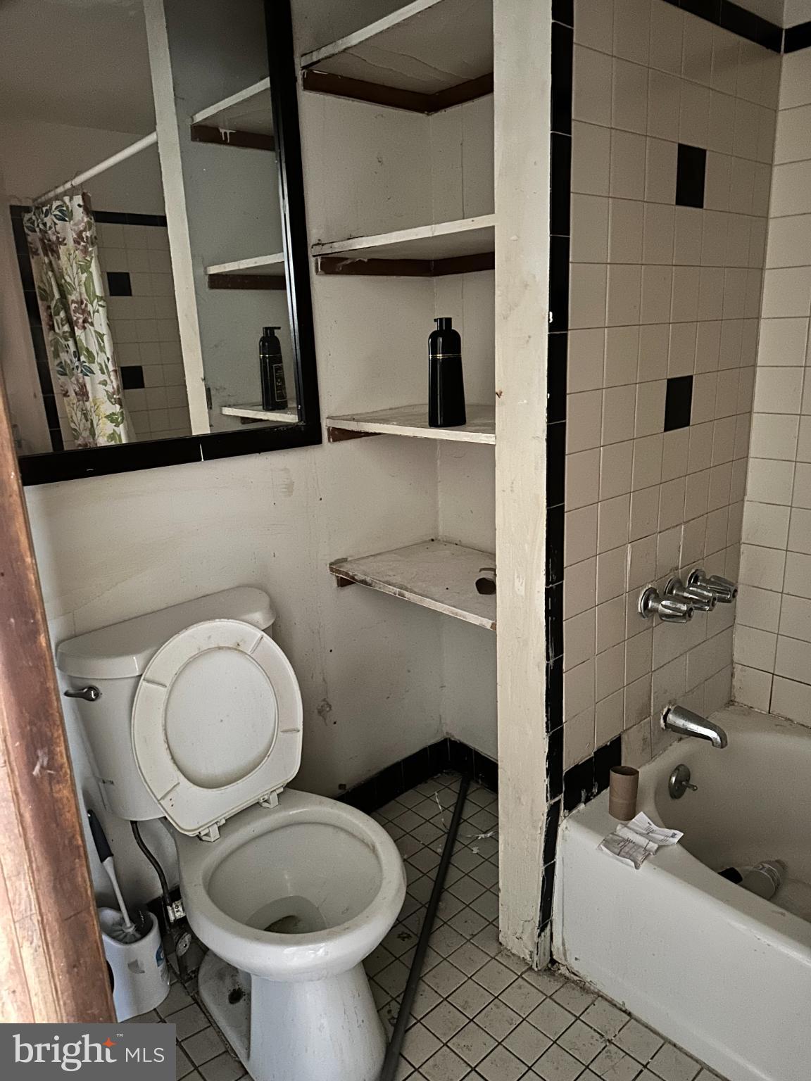 1508 West Nedro Avenue Philadelphia, PA 19141 - Photo 14 of 20 a bathroom with a toilet sink and mirror