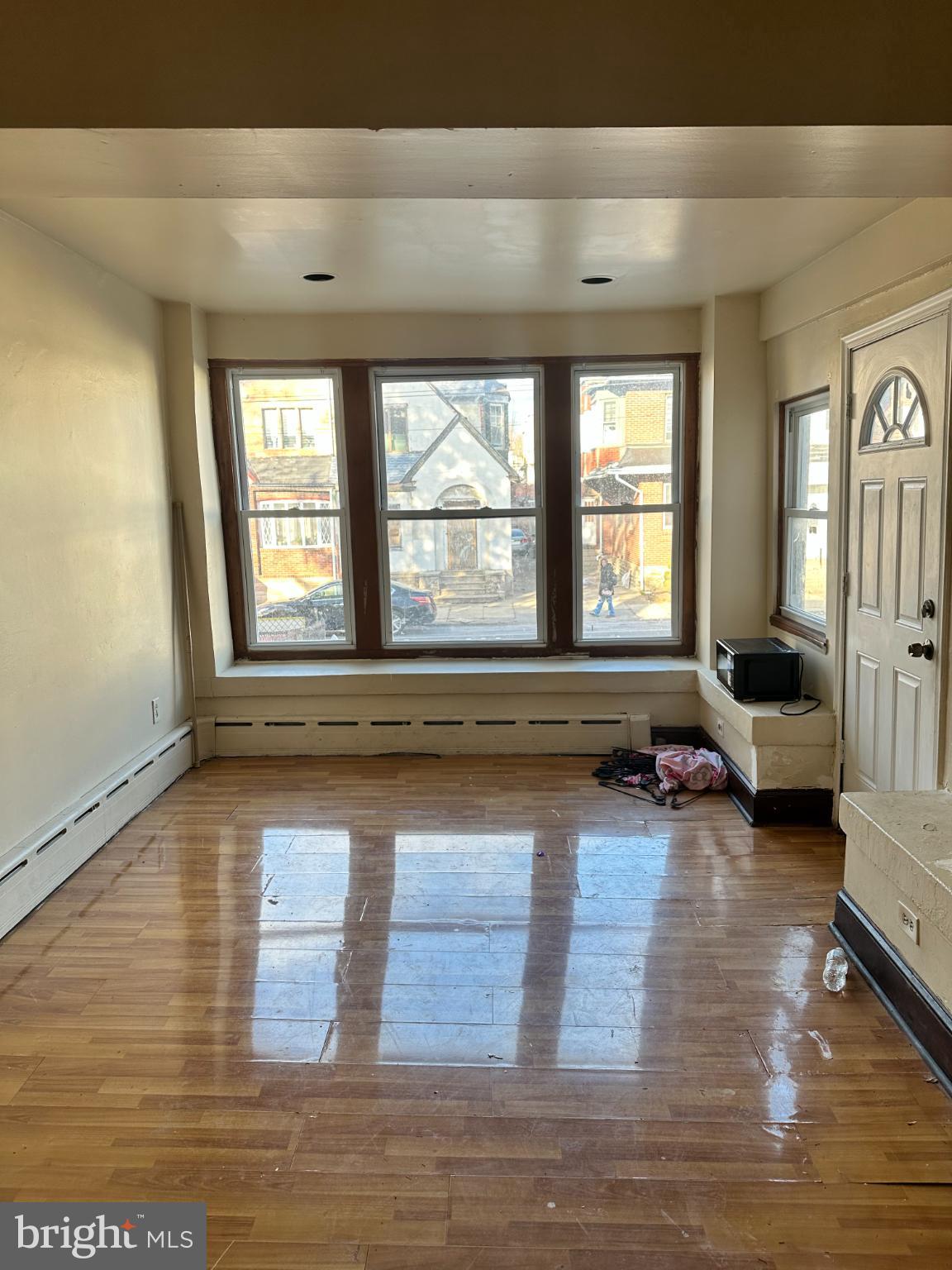 1508 West Nedro Avenue Philadelphia, PA 19141 - Photo 17 of 20 a living room with furniture and a large window