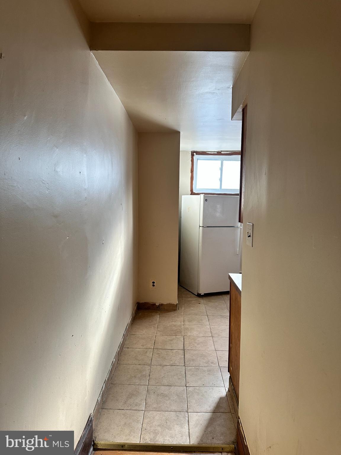 1508 West Nedro Avenue Philadelphia, PA 19141 - Photo 7 of 20 a view of empty room with a fireplace