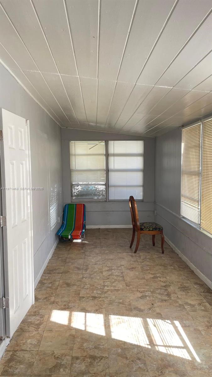 2908 Dunbar Street Fort Pierce, FL 34947 - Photo 4 of 10 a view of a room with gym equipment