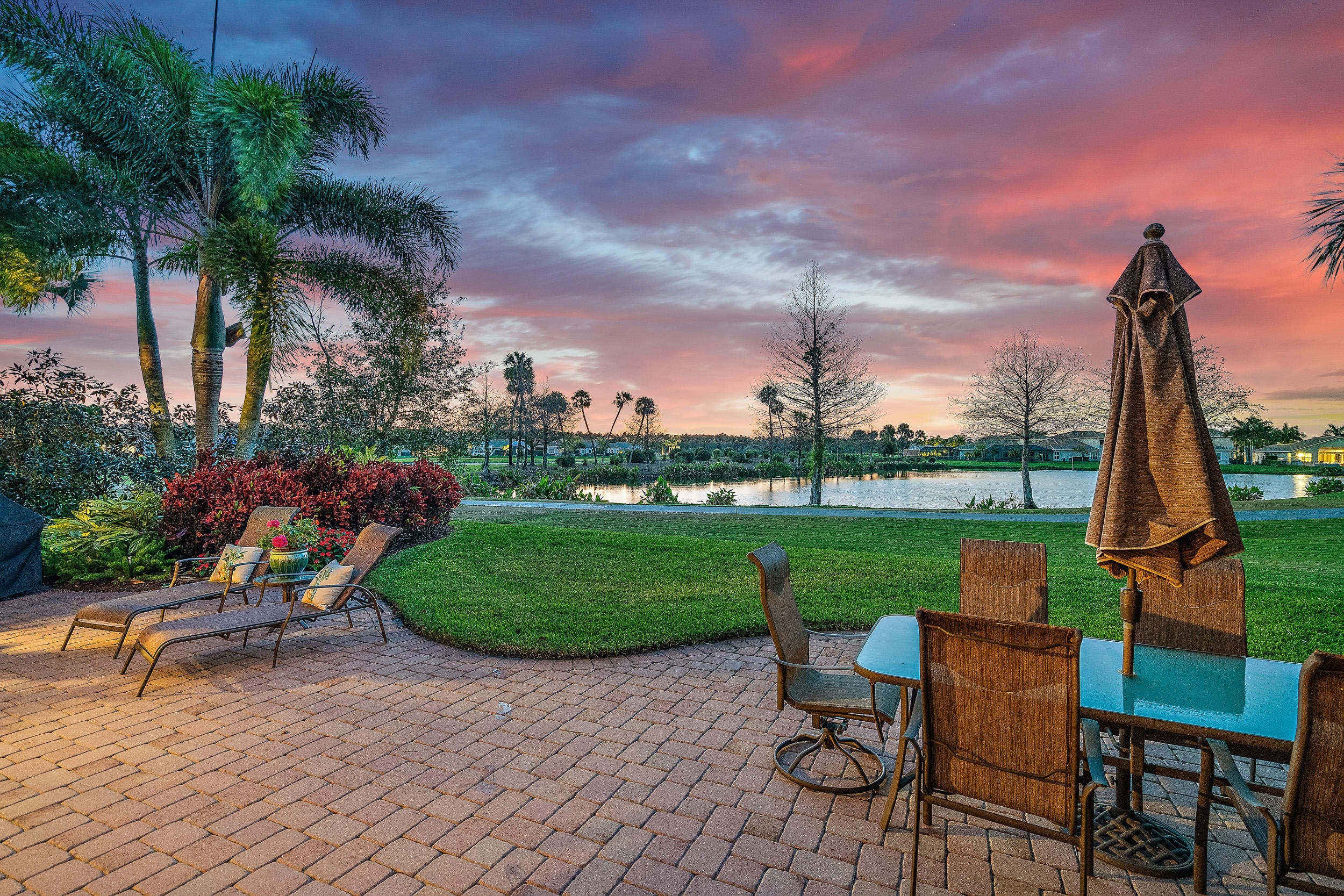 205 Carina Drive Jupiter, FL 33478 - Photo 30 of 46 Backyard Lake Views