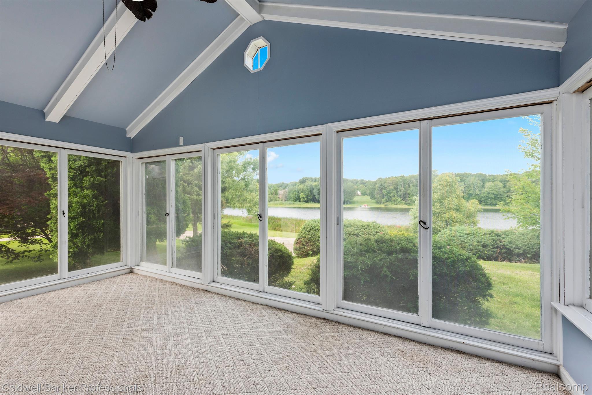 72200 Lassier Road Romeo, MI 48065 - Photo 11 of 28 View of the lake from 3-season room