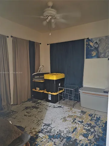 a room with furniture and a chandelier