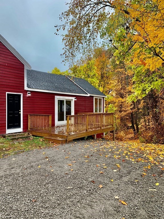 7 Center Road Shirley, MA 01464 - Photo 3 of 28 a view of a house with a yard