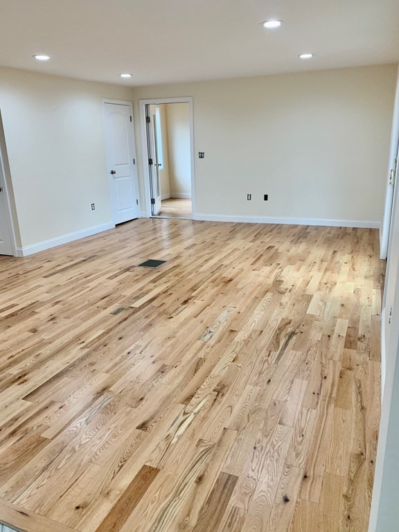 7 Center Road Shirley, MA 01464 - Photo 5 of 28 an empty room with wooden floor