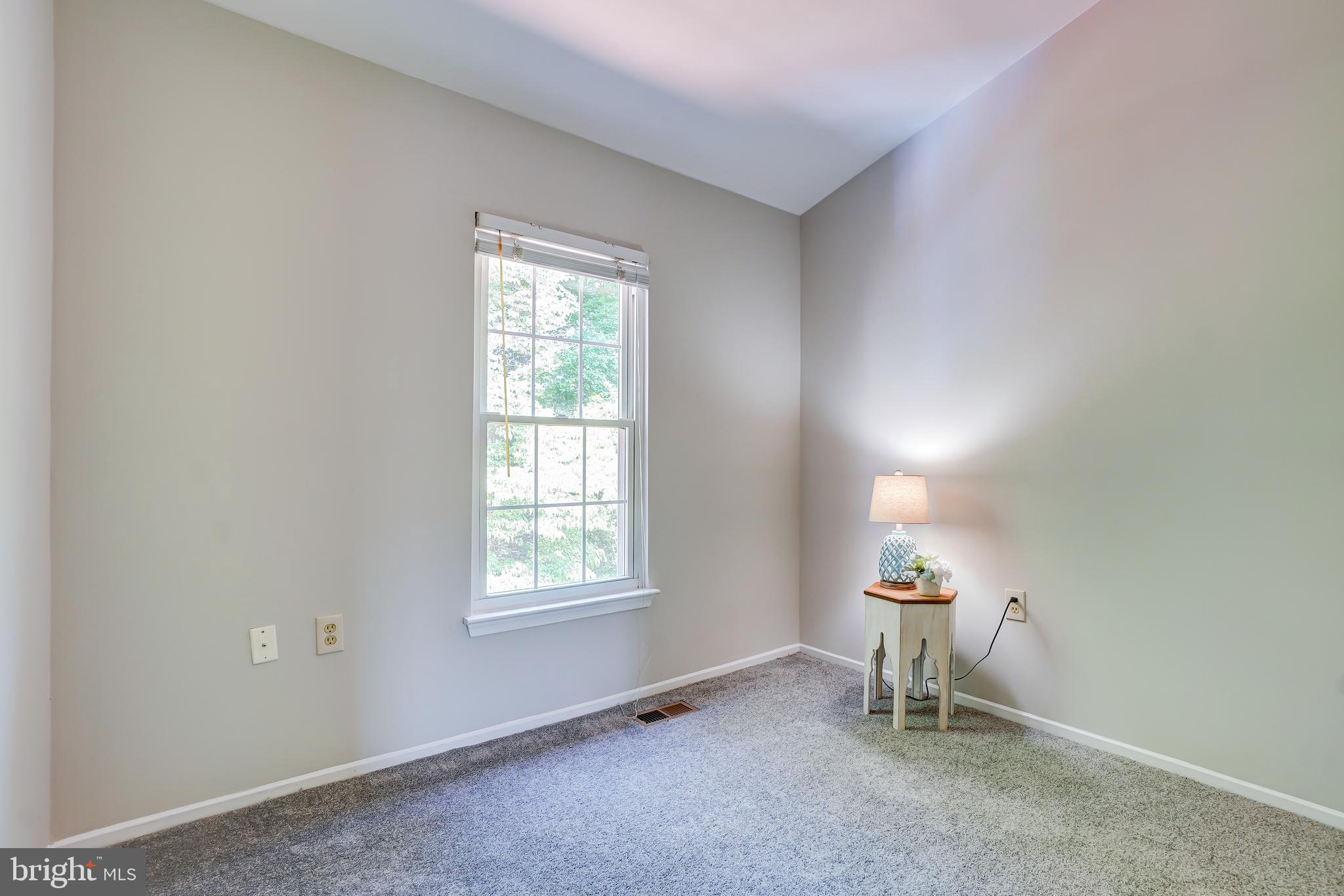 614 Suffield Drive Gaithersburg, MD 20878 - Photo 15 of 22 an empty room with windows