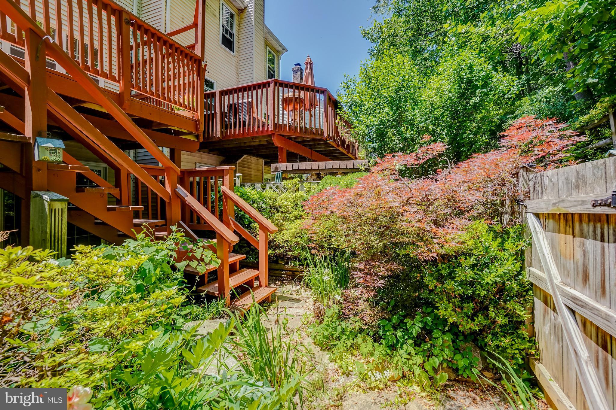 614 Suffield Drive Gaithersburg, MD 20878 - Photo 21 of 22 an aerial view of a house with a yard and potted plants