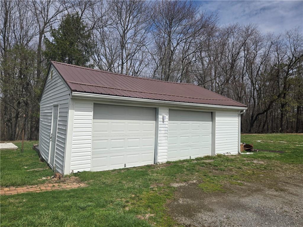 1425 Barclay Hill Road Beaver, PA 15009 - Photo 28 of 30 a backyard of a house with a garden and barbeque oven