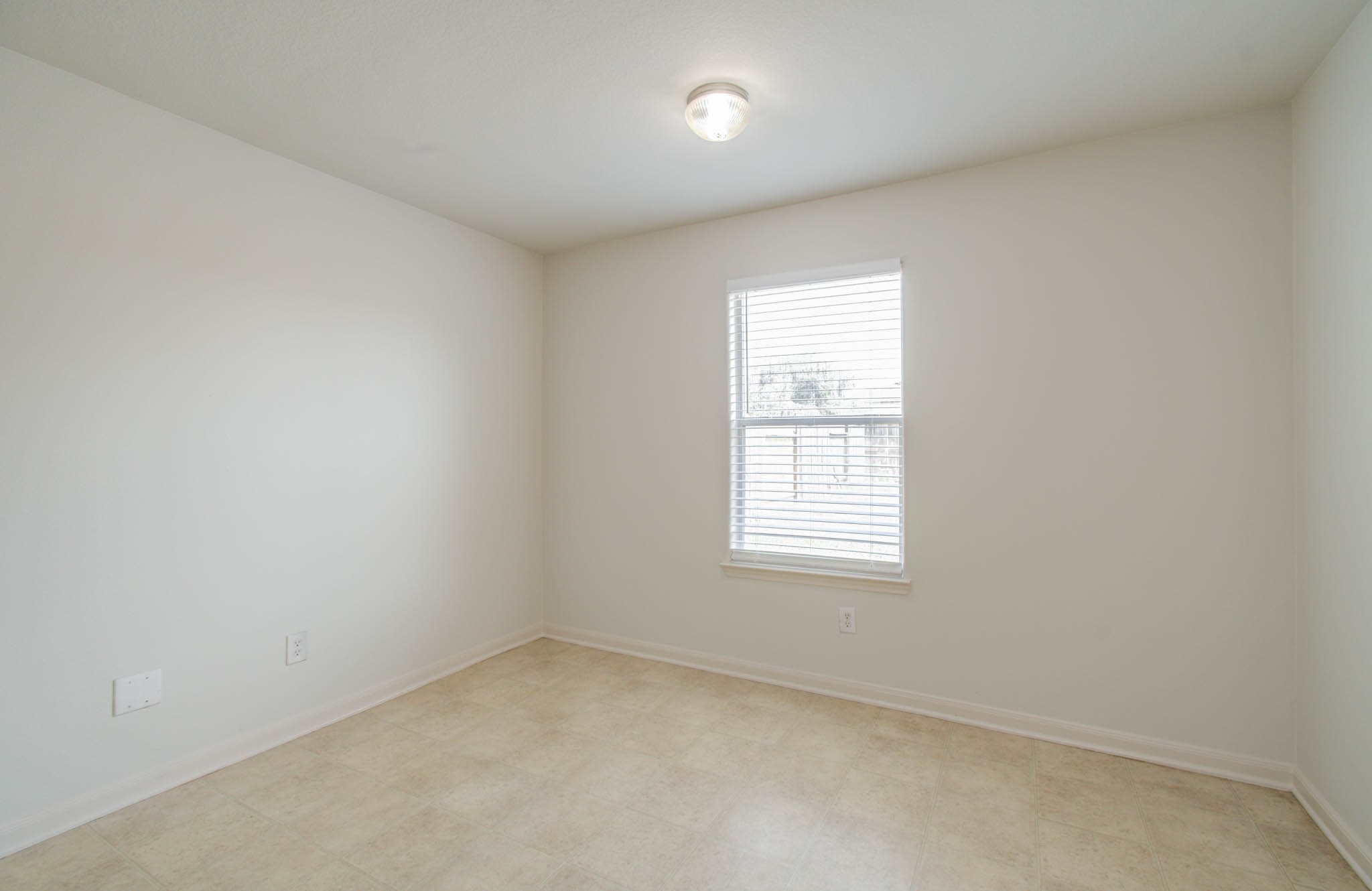 4239 Nueces River Loop Spring, TX 77386 - Photo 25 of 50 an empty room with a window