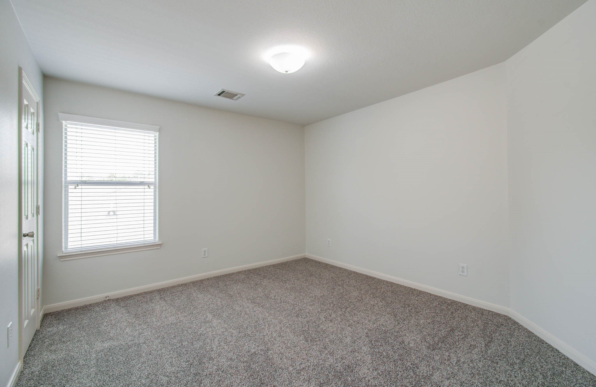 4239 Nueces River Loop Spring, TX 77386 - Photo 32 of 50 an empty room with a window