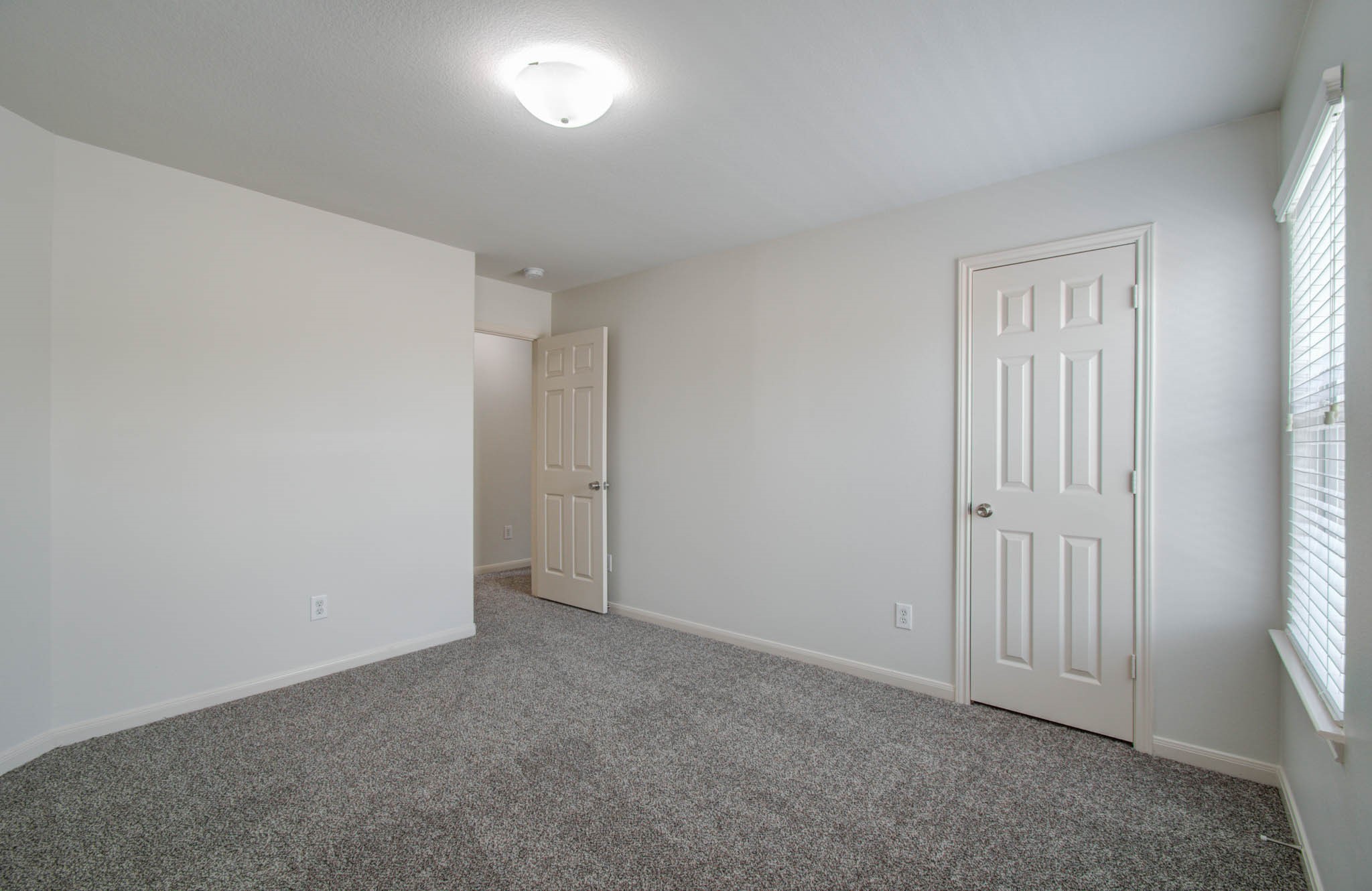 4239 Nueces River Loop Spring, TX 77386 - Photo 33 of 50 an empty room with windows