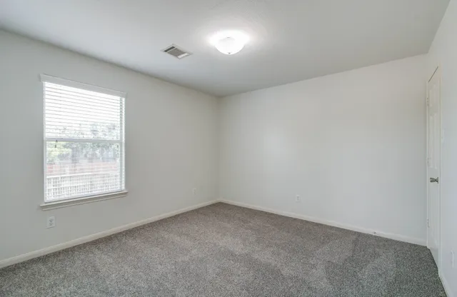 an empty room with an entryway