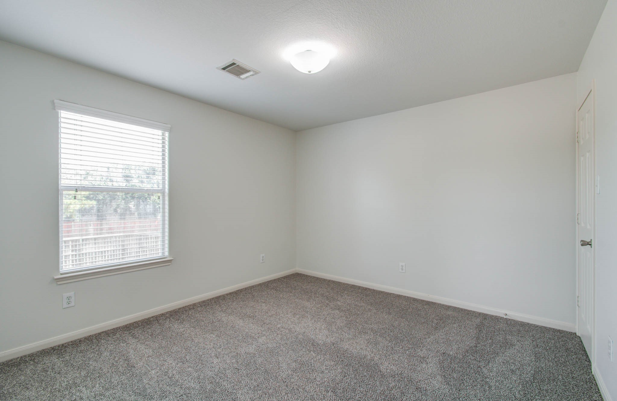 4239 Nueces River Loop Spring, TX 77386 - Photo 36 of 50 an empty room with a window