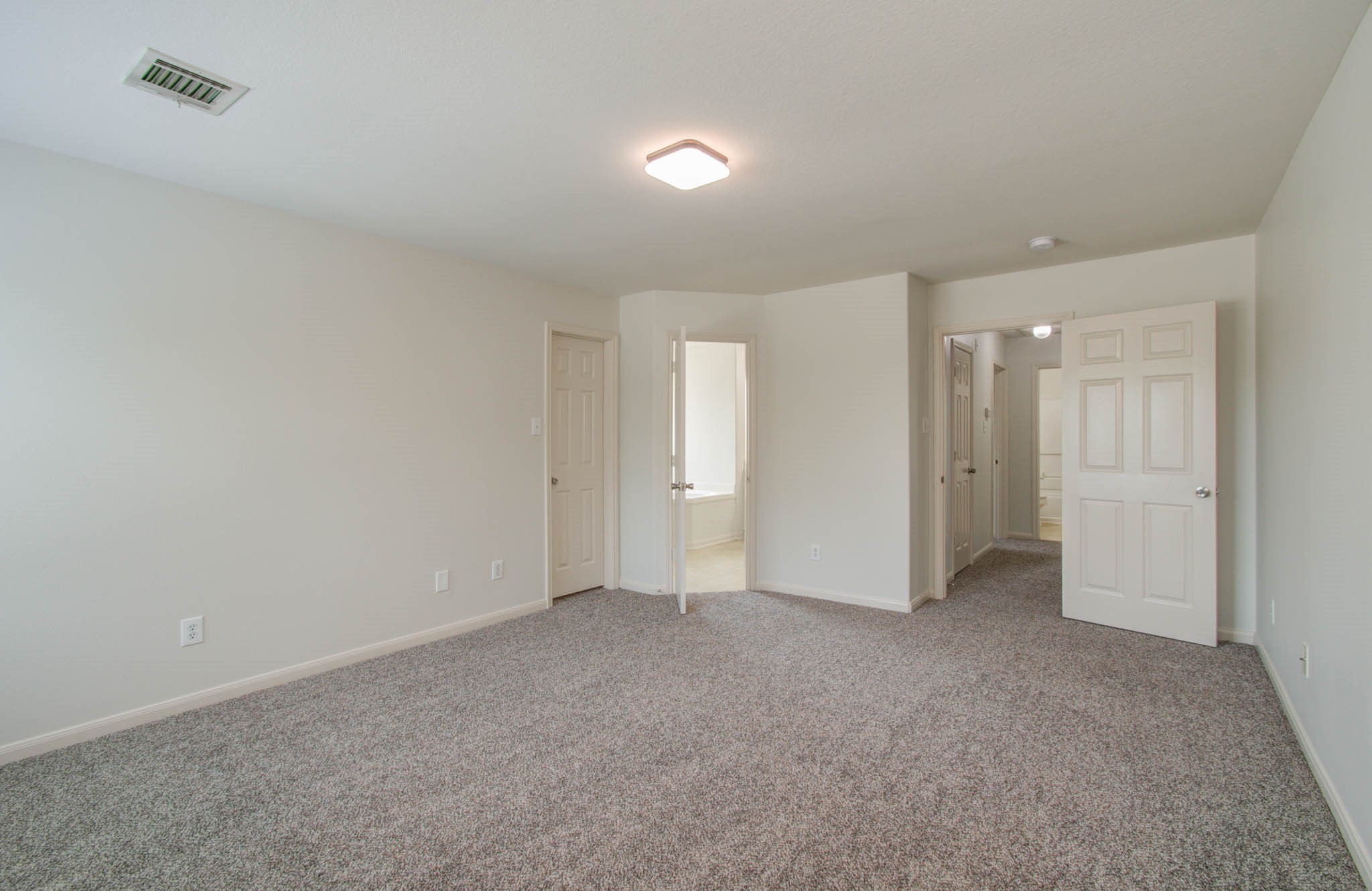 4239 Nueces River Loop Spring, TX 77386 - Photo 41 of 50 a view of an empty room and a bathroom