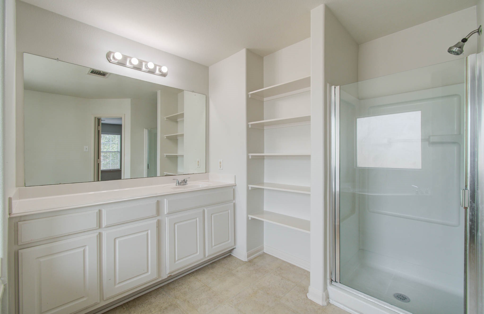 4239 Nueces River Loop Spring, TX 77386 - Photo 43 of 50 a spacious bathroom with a shower and a sink