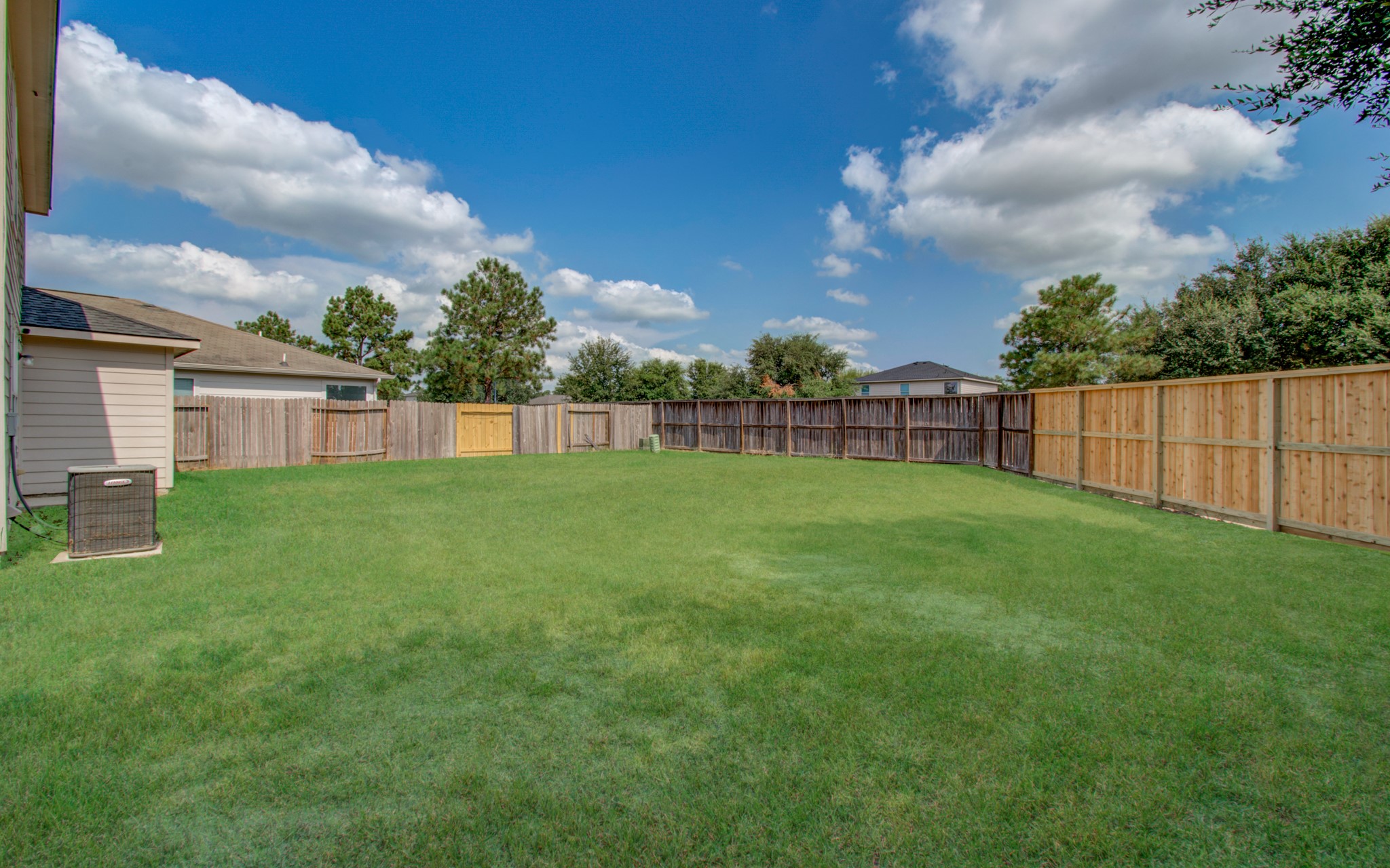 4239 Nueces River Loop Spring, TX 77386 - Photo 50 of 50 a view of a backyard with a garden