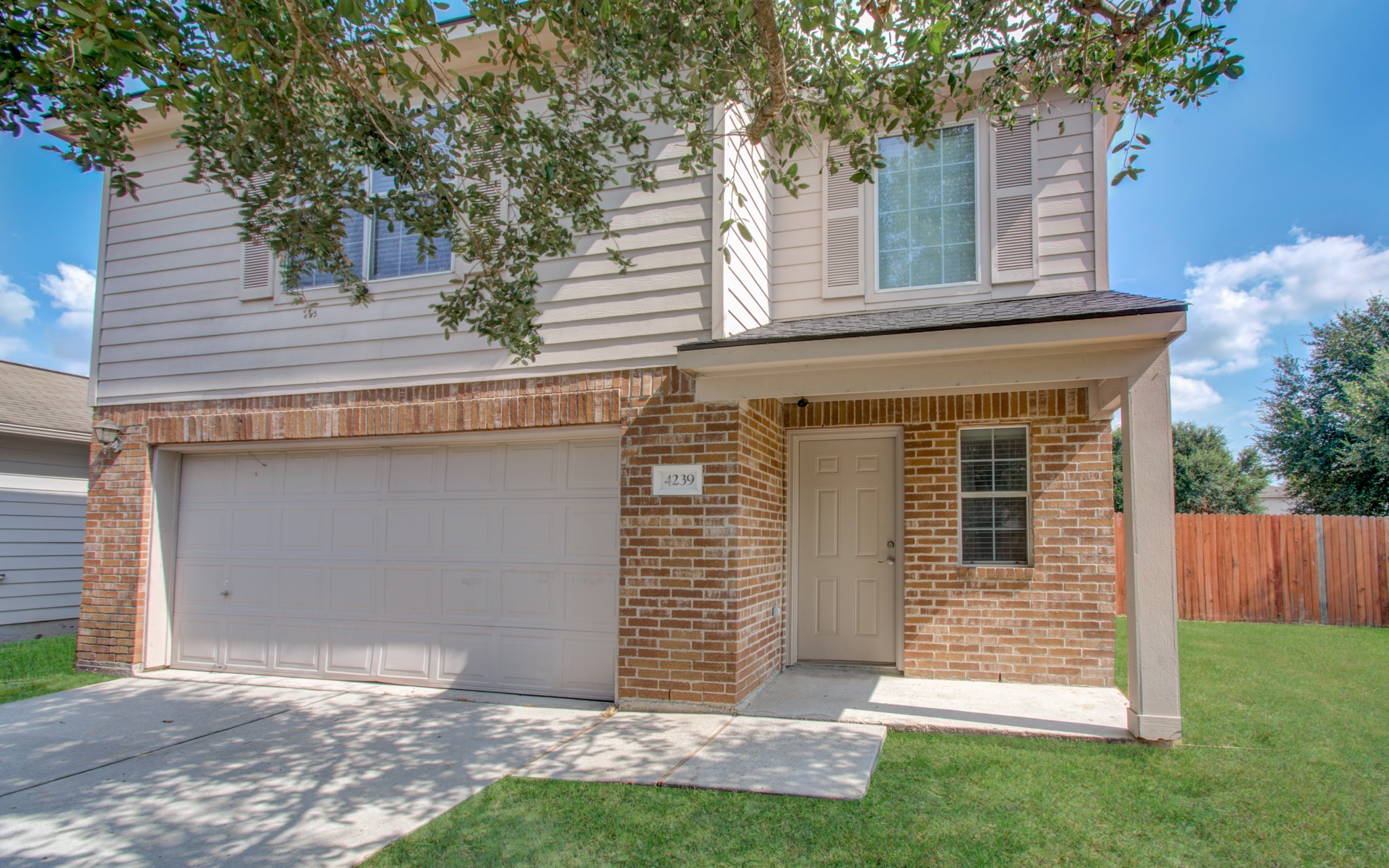 4239 Nueces River Loop Spring, TX 77386 - Photo 5 of 50 a front view of a house with a yard