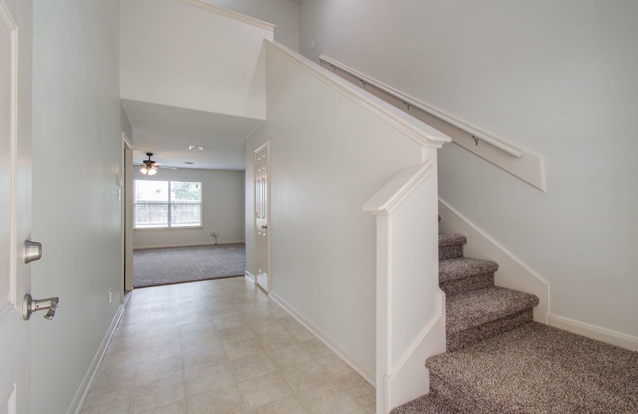 4239 Nueces River Loop Spring, TX 77386 - Photo 7 of 50 a view of a hallway view with staircase