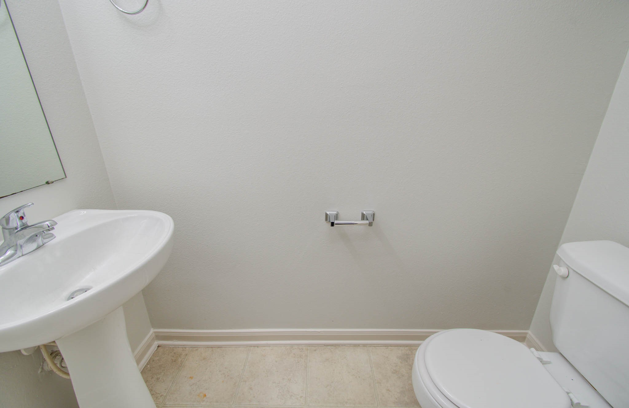 4239 Nueces River Loop Spring, TX 77386 - Photo 9 of 50 a white toilet sitting next to a bathroom sink