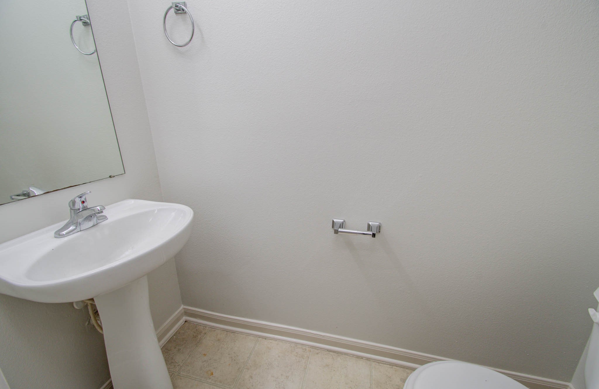 4239 Nueces River Loop Spring, TX 77386 - Photo 10 of 50 a bathroom with a sink and mirror