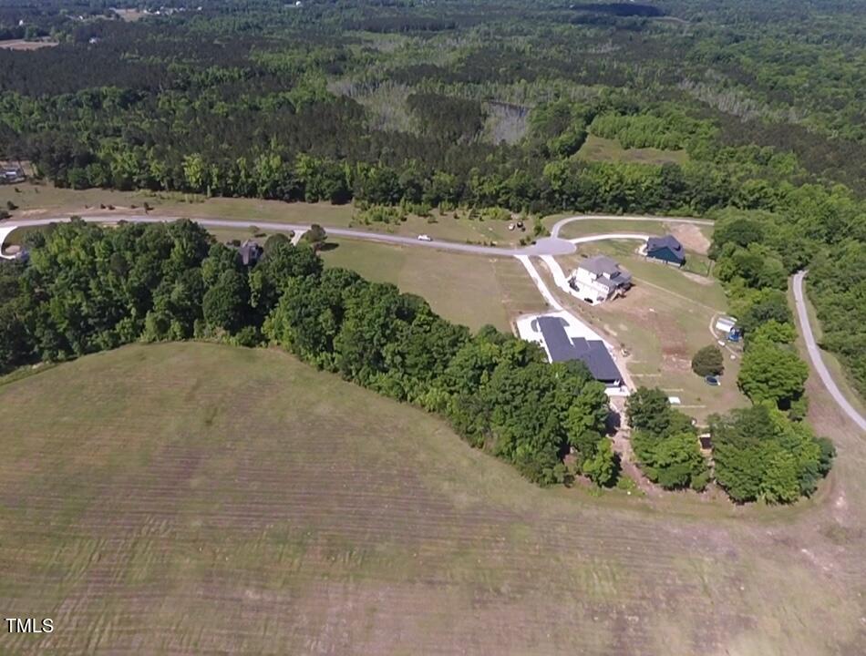 684 Lake Magnolia Way Smithfield, NC 27577 - Photo 8 of 19 an aerial view of a house with yard