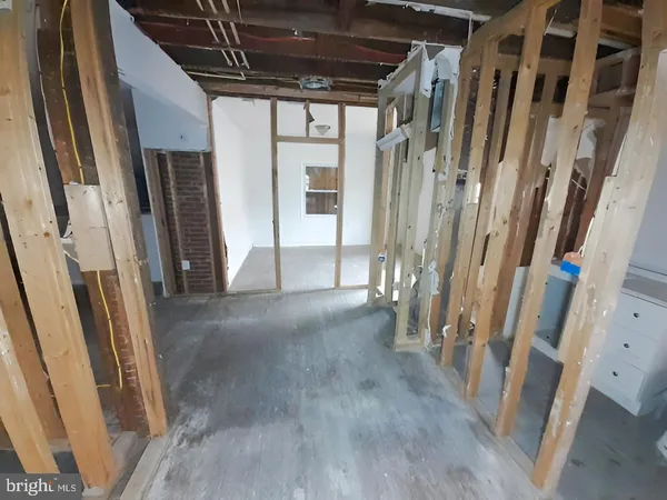 a view of an empty room with stairs