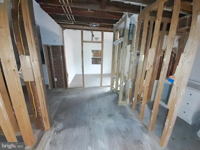 a view of an empty room with stairs