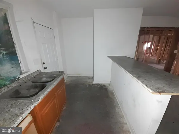 a view of a hallway with a small space