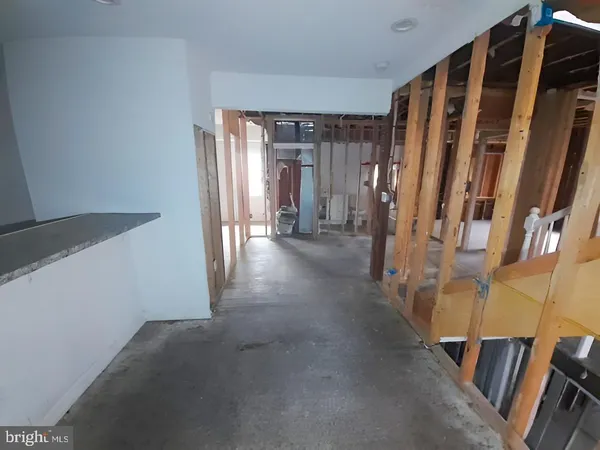 a view of a hallway with closet