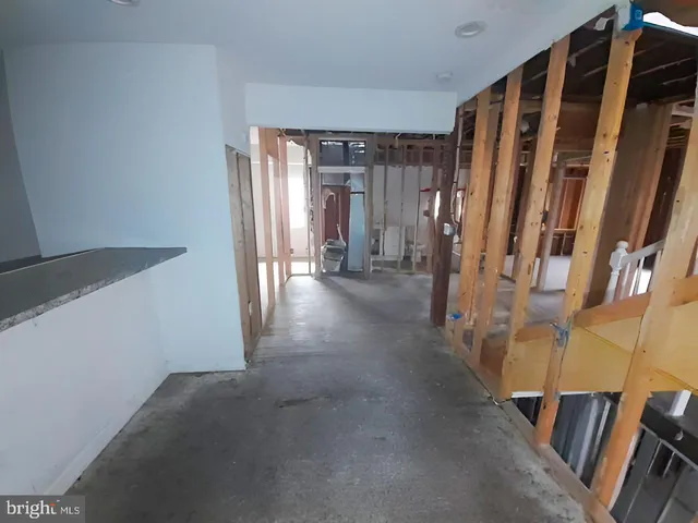 a view of a hallway with closet