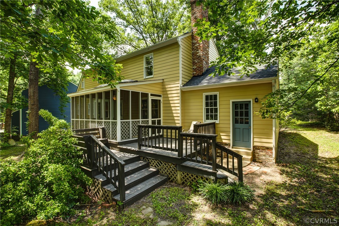 703 Fennimore Road Midlothian, VA 23114 - Photo 20 of 22 a view of a house with backyard and sitting area