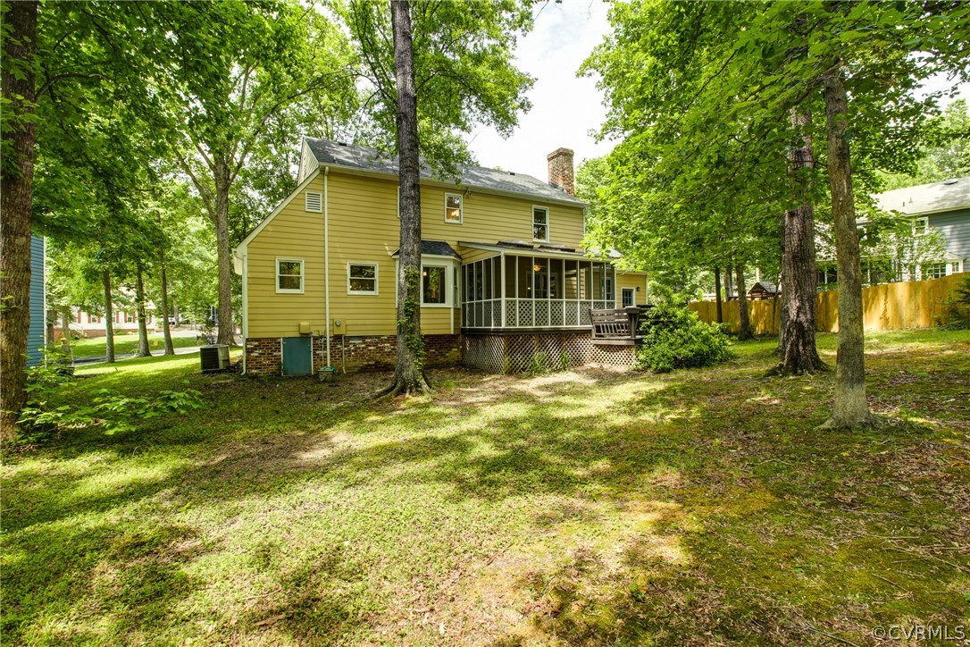 703 Fennimore Road Midlothian, VA 23114 - Photo 22 of 22 a front view of a house with a yard table and chairs