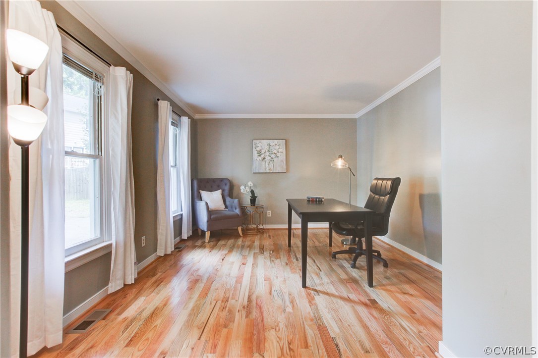 703 Fennimore Road Midlothian, VA 23114 - Photo 5 of 22 a workspace with furniture window and wooden floor