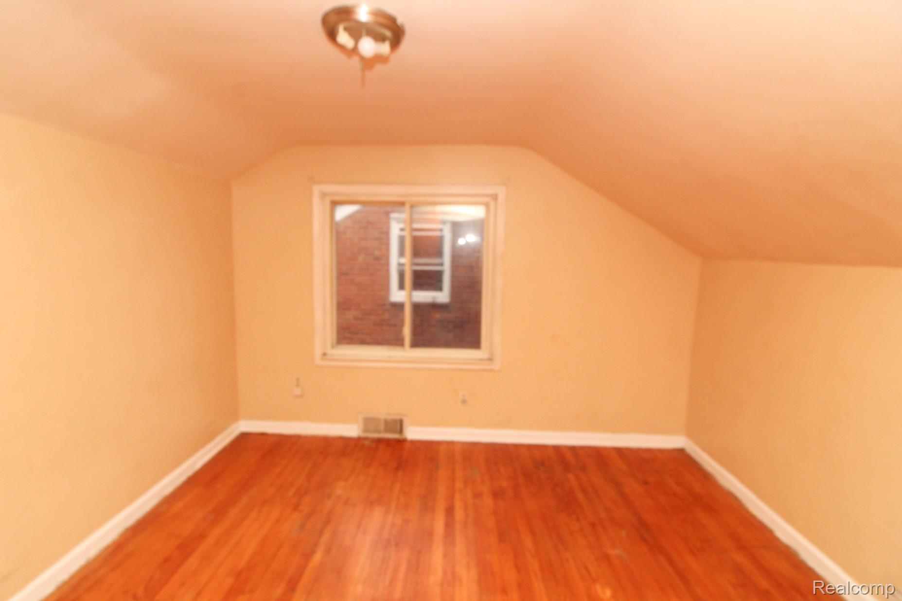 12107 Rutherford Street Detroit, MI 48227 - Photo 8 of 10 12107 Rutherford Upper Bed.jpeg
