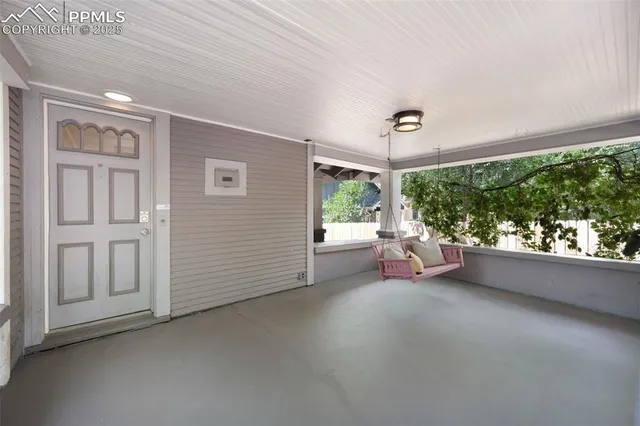 a backyard of a house with seating space