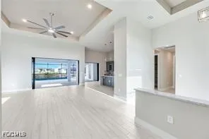 a view of a hallway with a chandelier