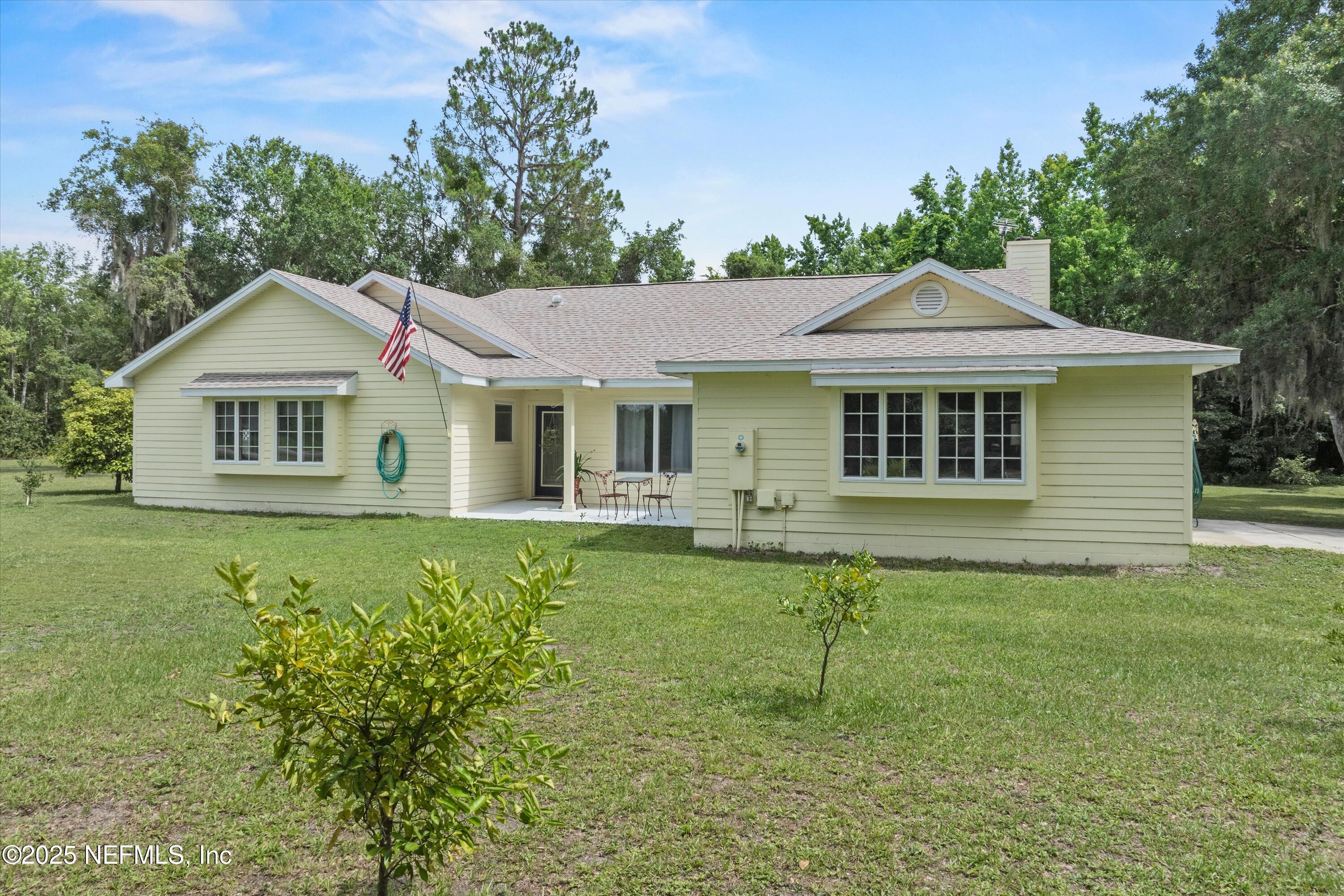 7720 Riverdale Road St. Augustine, FL 32092 - Photo 3 of 60 a front view of a house with a yard