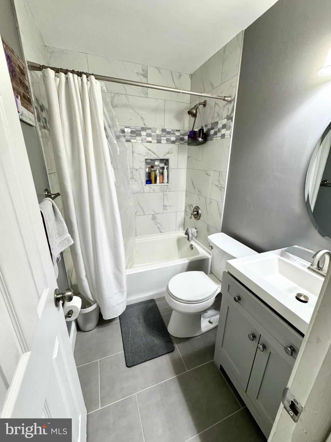 813 Thimbleberry Road, Unit 813 Baltimore, MD 21220 - Photo 16 of 32 Modern bathroom with elegant finishes.