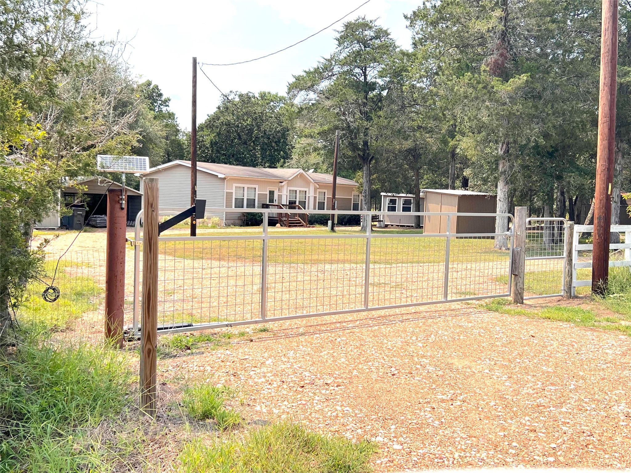 1079 Schuette Road New Ulm, TX 78950 - Photo 3 of 20 a view of a backyard