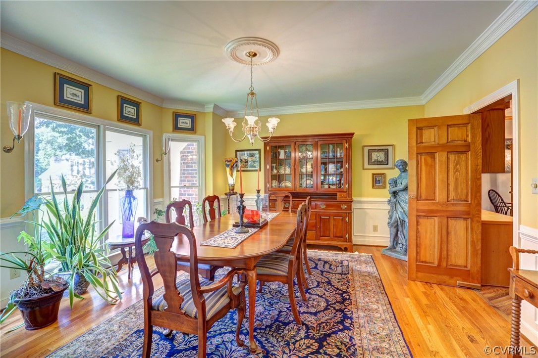 3208 St Stephens Way Midlothian, VA 23113 - Photo 7 of 47 Sunny Dining Room with wood floor, picture trim mo
