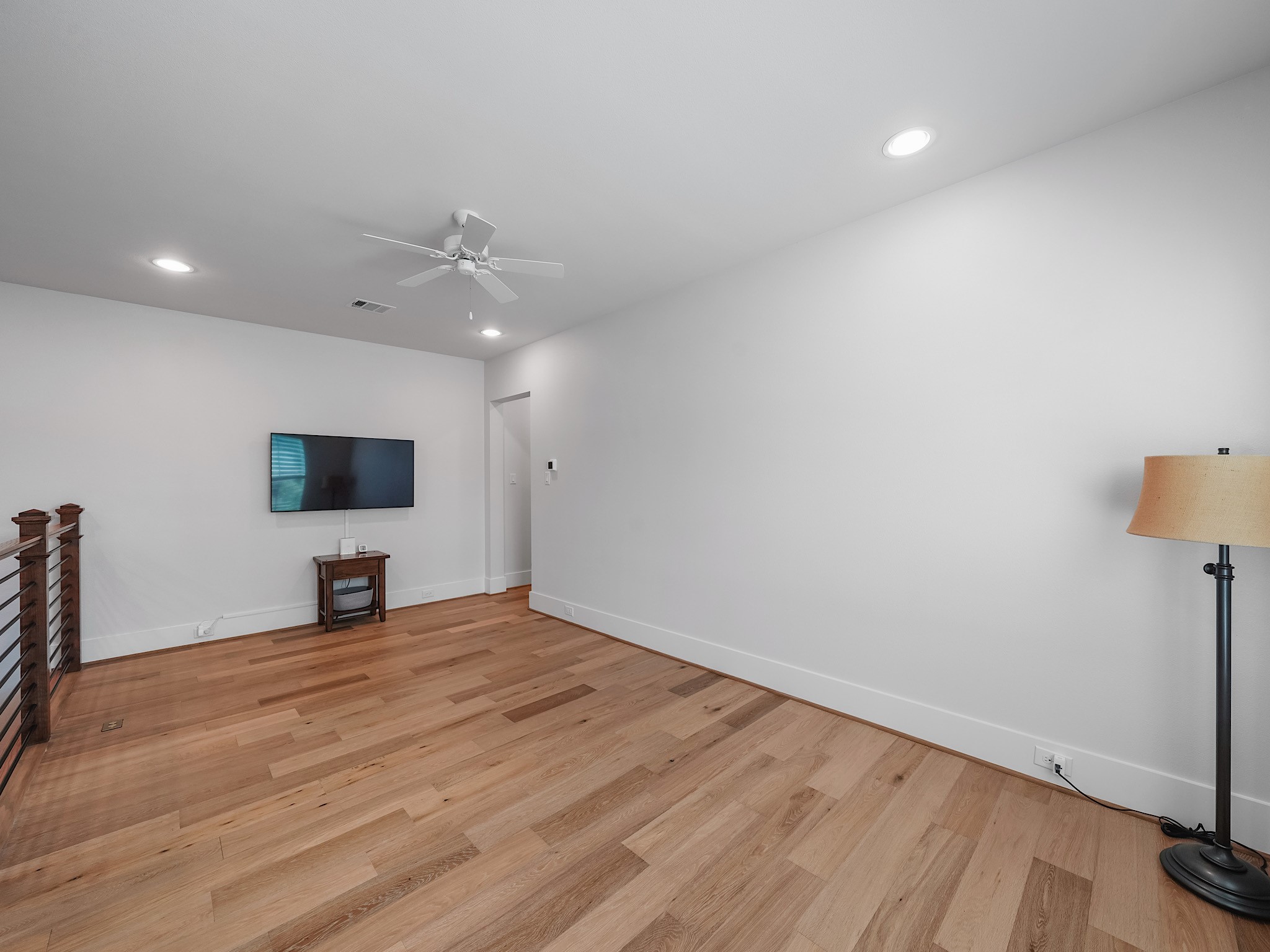 812 East 24th Street Houston, TX 77009 - Photo 19 of 36 a room with a bed and a flat screen tv