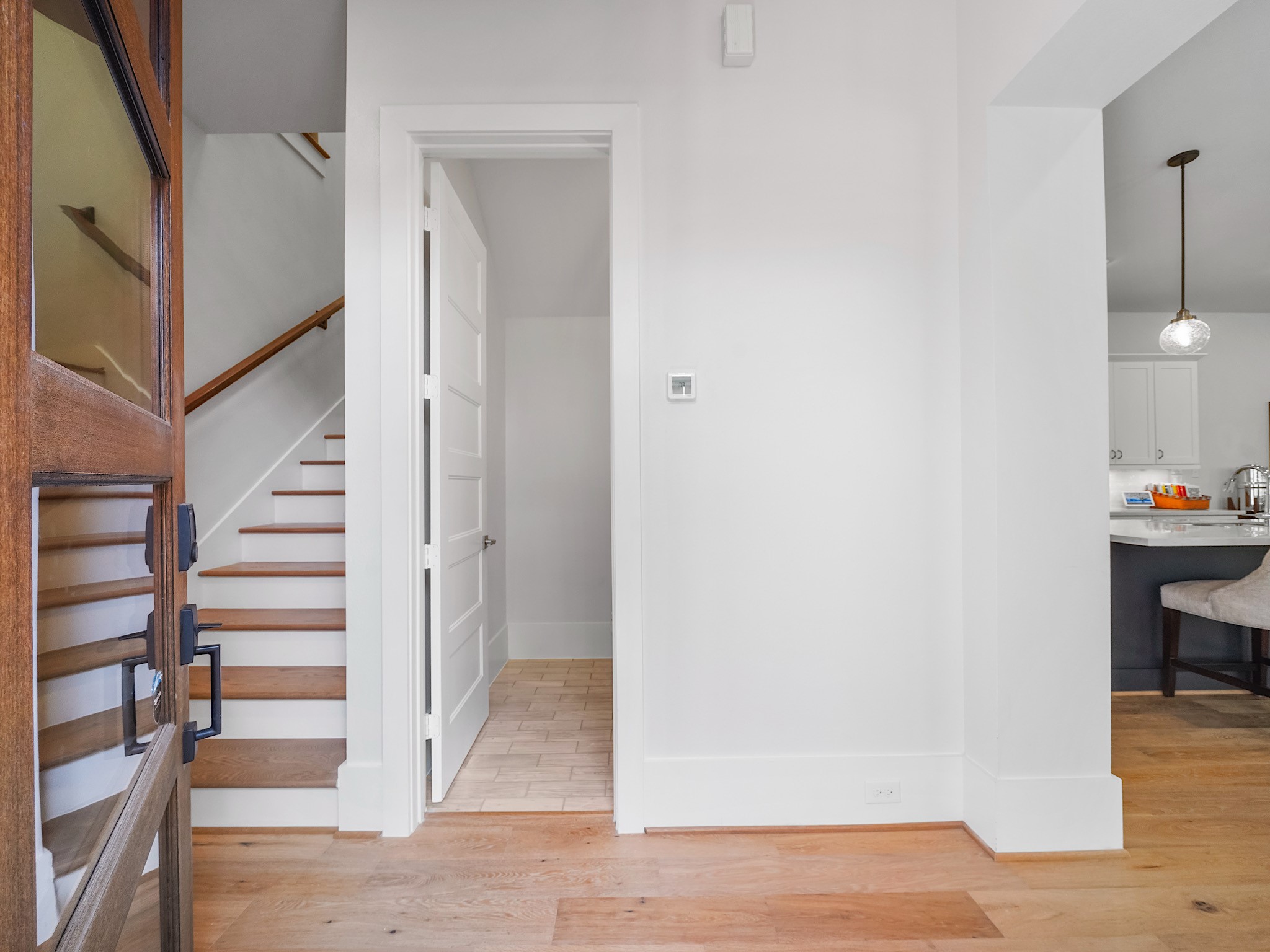 812 East 24th Street Houston, TX 77009 - Photo 3 of 36 a view of entryway and hall with wooden floor