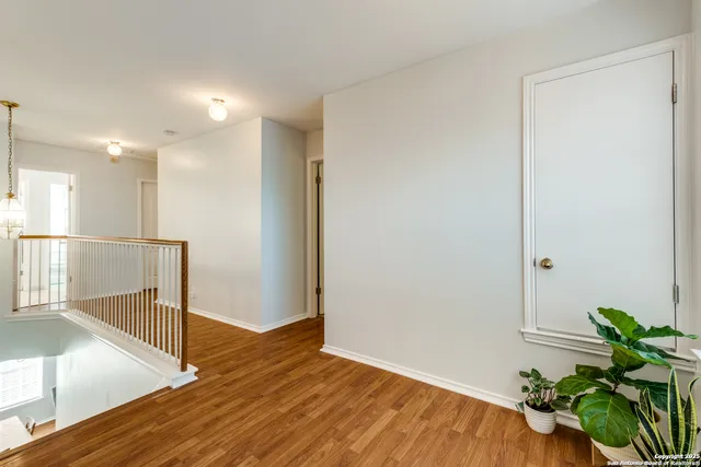 a view of entryway with wooden floor